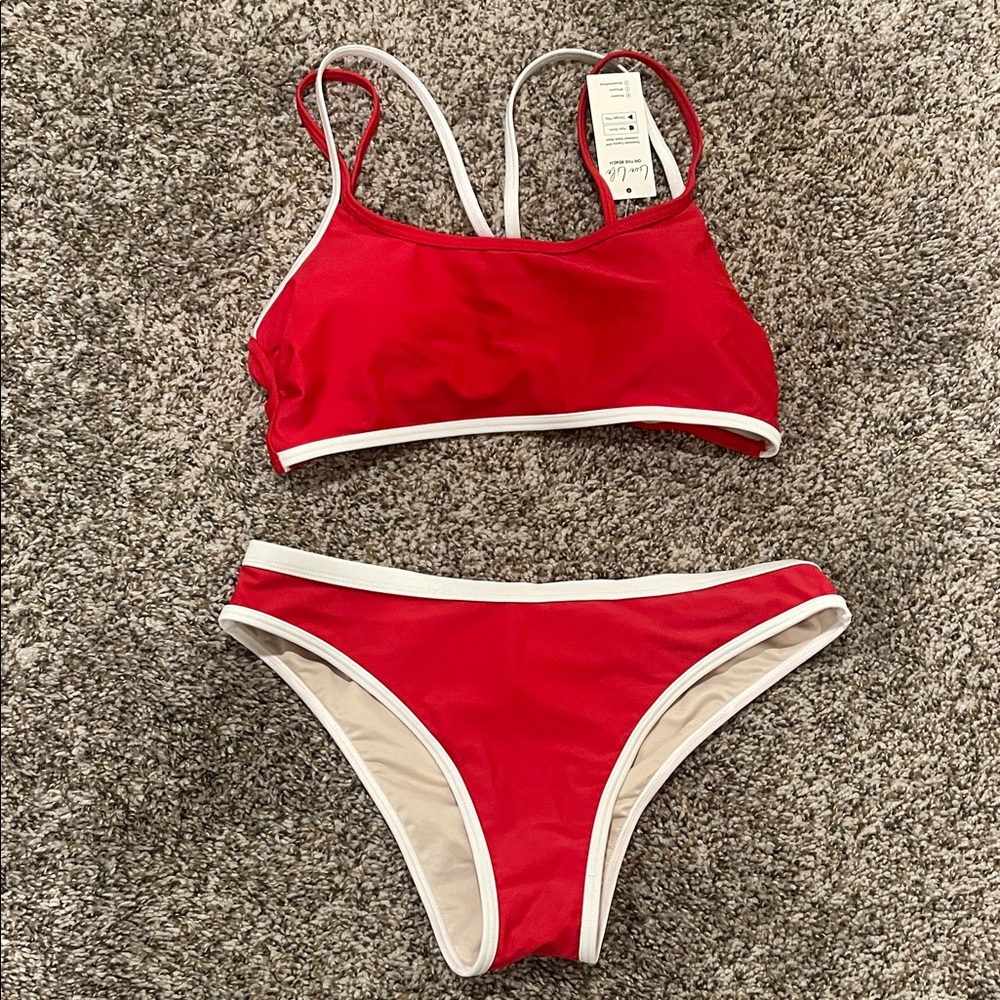 Red and White Bikini Top size S Cupshe
Brand new, with tags attached